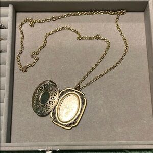 Avon Gold Tone Ornate Locket Necklace